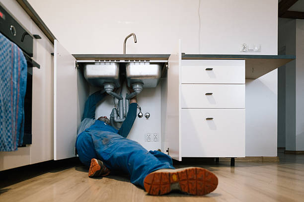 Professional Drain Cleaning technician working in Bradleyville, MO